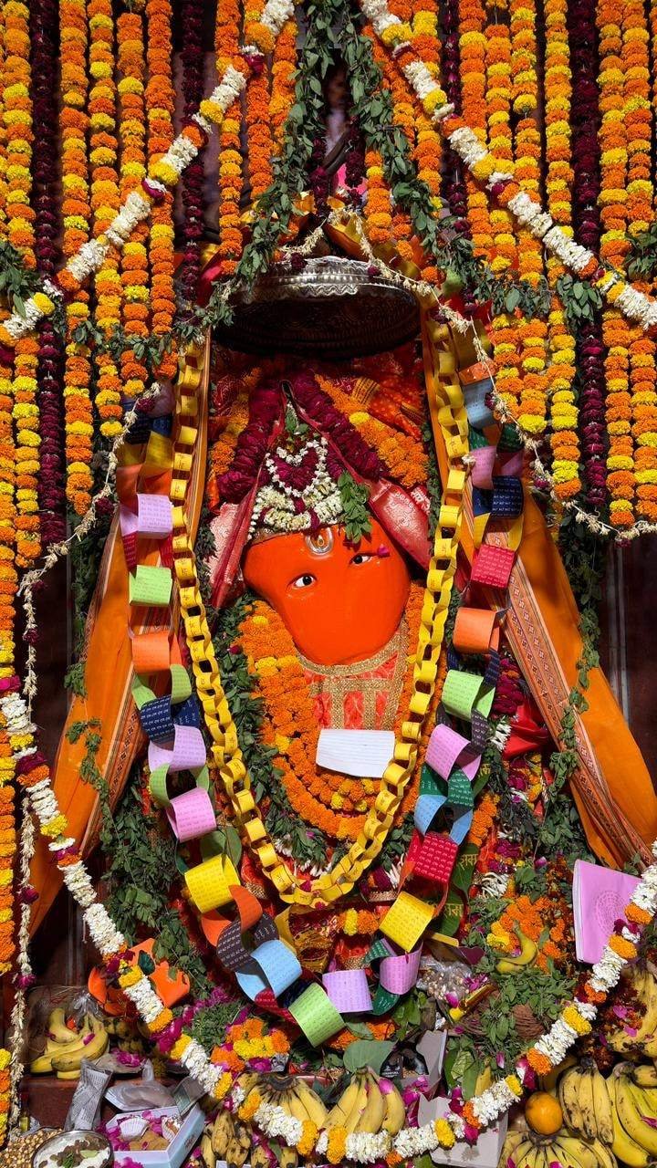 Close view of the Hanuman ji murti decorated with marigold garlands